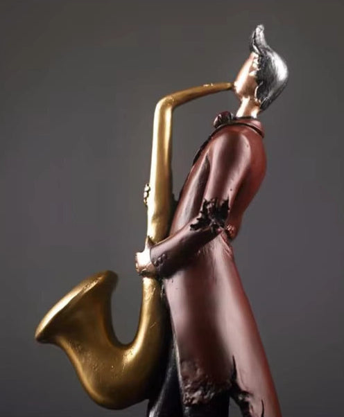 A Band of Four Musicians - Guitarist, Cellist, Violinist, Saxaphonist
